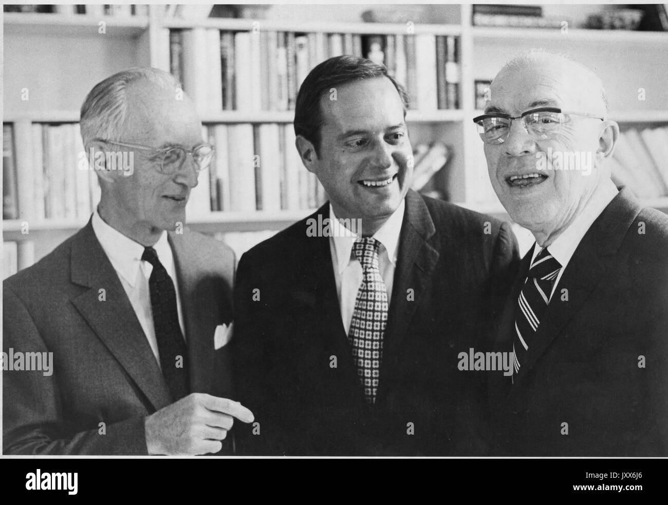 Milton Stover Eisenhower, Alonzo Galloway Decker, Jr, Steven Muller, Candid photograph of Eisenhower, Muller and Decker, 1973. Stock Photo