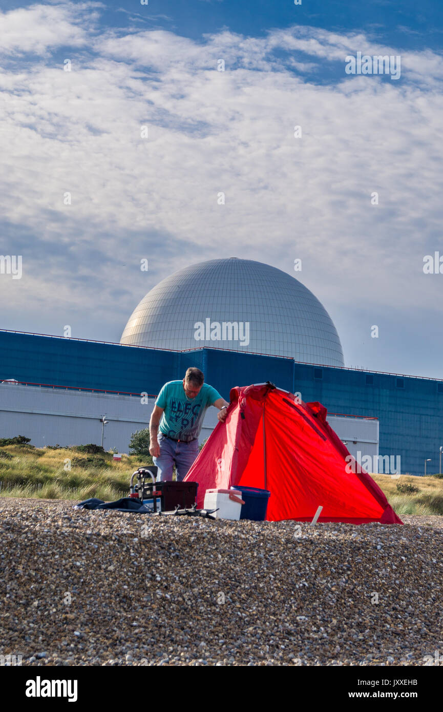 Sea anglers on the beach in front of Sizewell B PWR nuclear reactor, Sizewell Beach, Suffolk, England Stock Photo