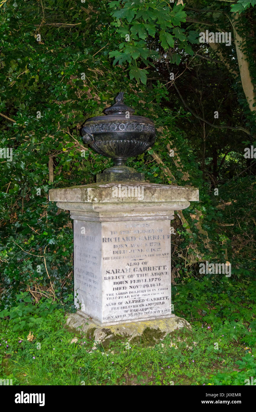 Grecian urn memorial to Richard Garrett, agricultural engineer, 1755 - 1839, and wife Sarah, St. Margaret's churchyard, Leiston, Suffolk, England Stock Photo