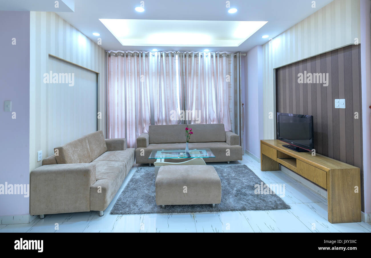 Modern living room in luxury apartments with airy, clean amenities ...