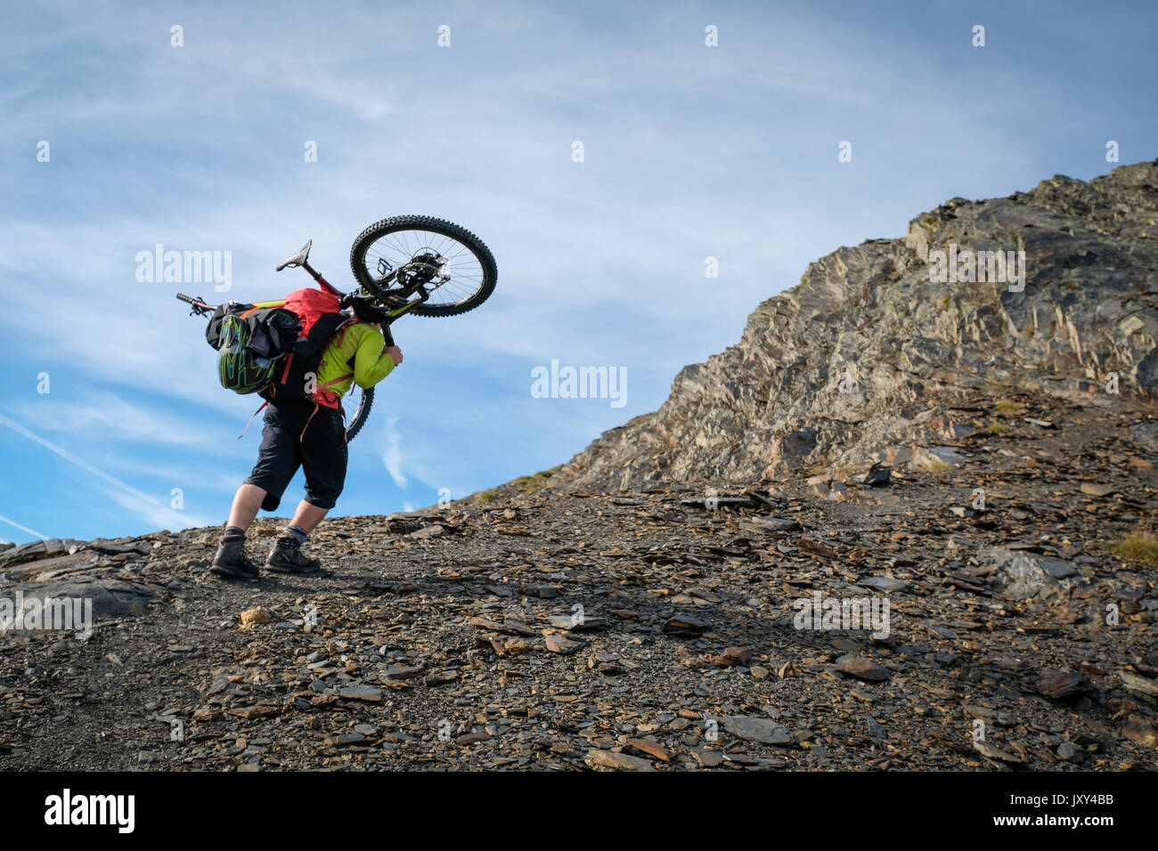 In french pyrenees (south of France), Alexis Righetti, adrenaline seeker and very talented biker, ride the mountain in an extreme way. Aragnouer - Fra Stock Photo