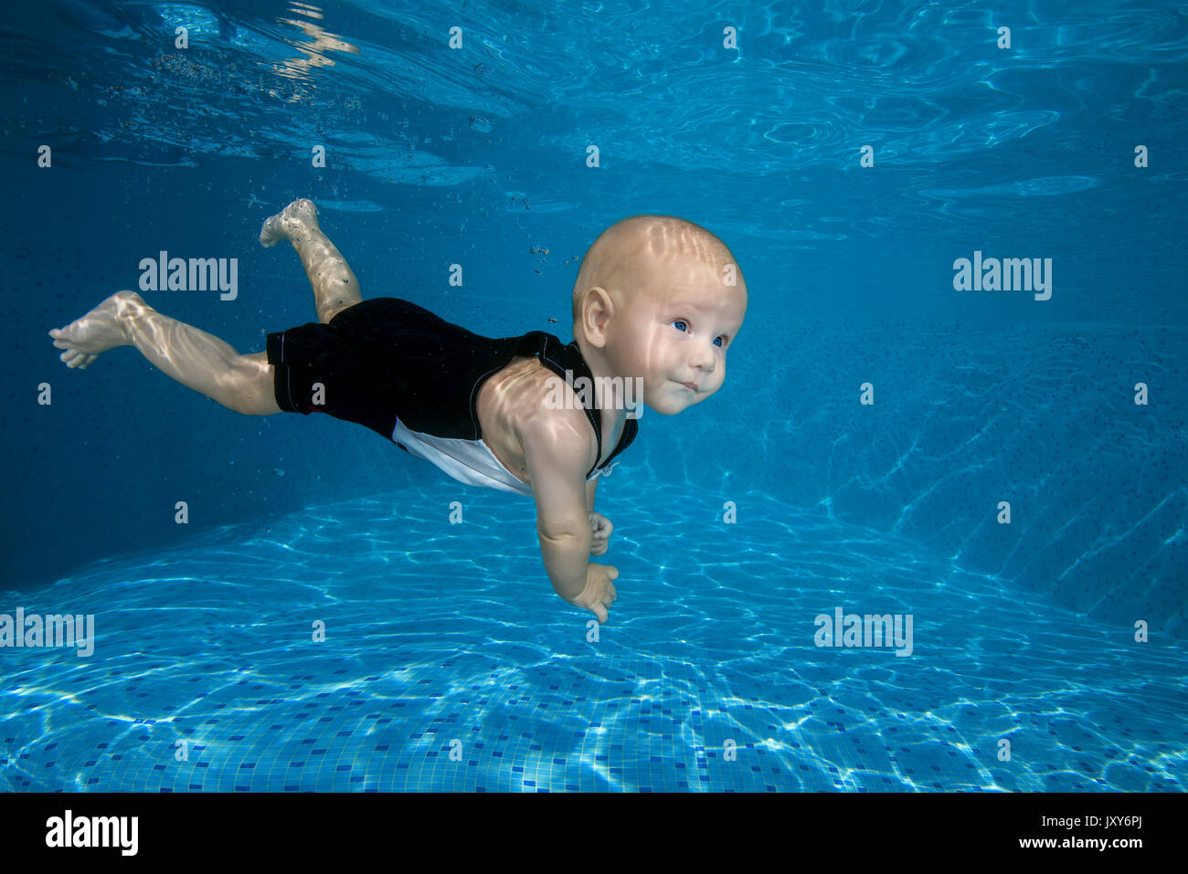 boy to swim in the pool Stock Photo