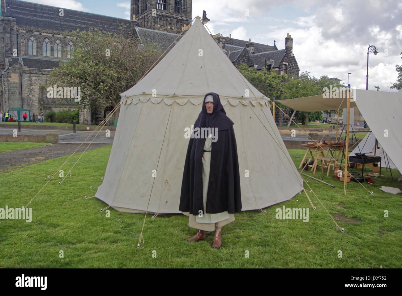 The Company of St Margaret historical re-enactment group  at Paisley abbey for spa shot and the witches trial monk or apothecary with fare Stock Photo