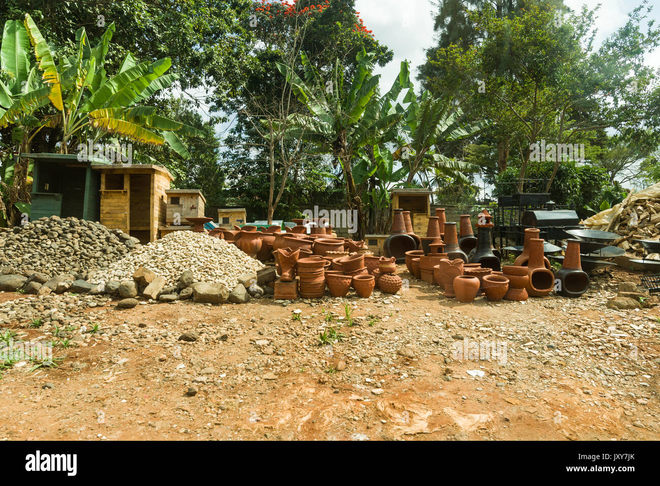Various clay pottery chimneys and pots for sale on roadside, Kenya