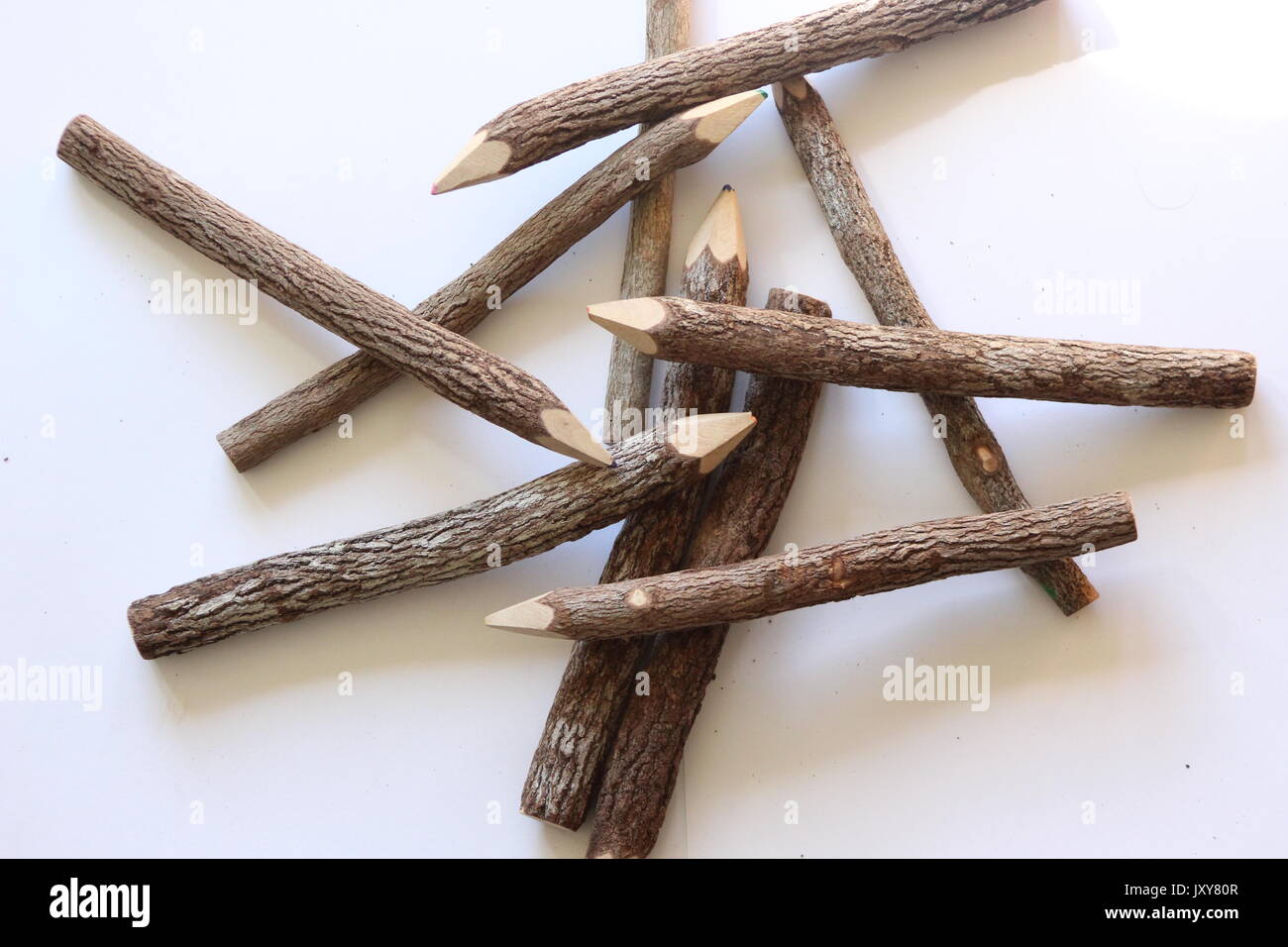 Pile of wooden colored pencils with an interesting treelike texture
