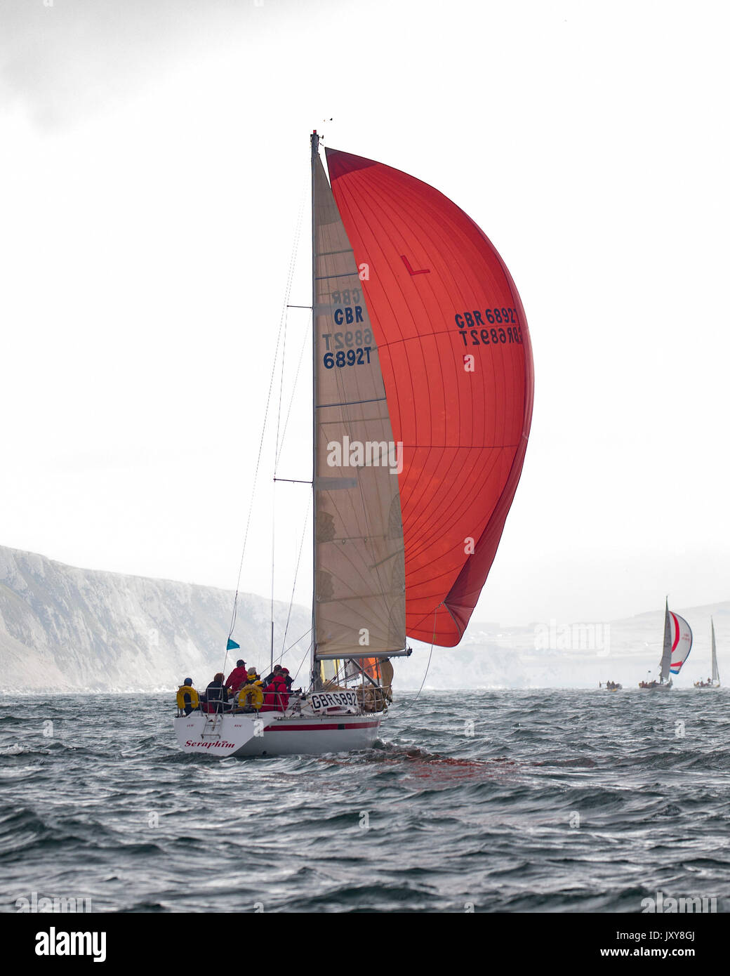 Beneteau First 35 GBR2406L 'Run' heads for St Catherine's under spinnaker in the 2017 Round the Island Race Stock Photo