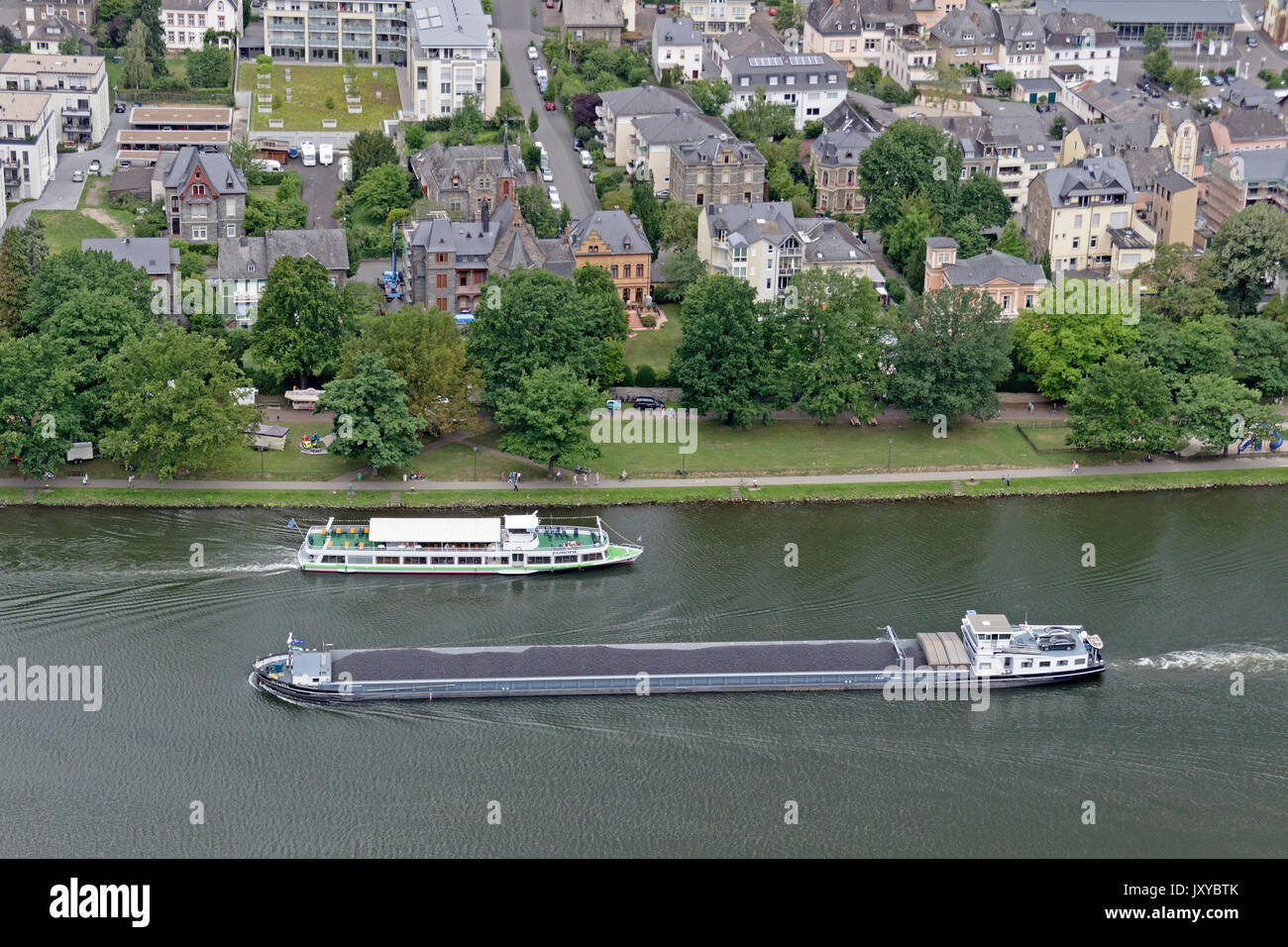 excursion boat passing Bernkastel-Kues, Moselle, Rhineland-Palatinate, Germany Stock Photo