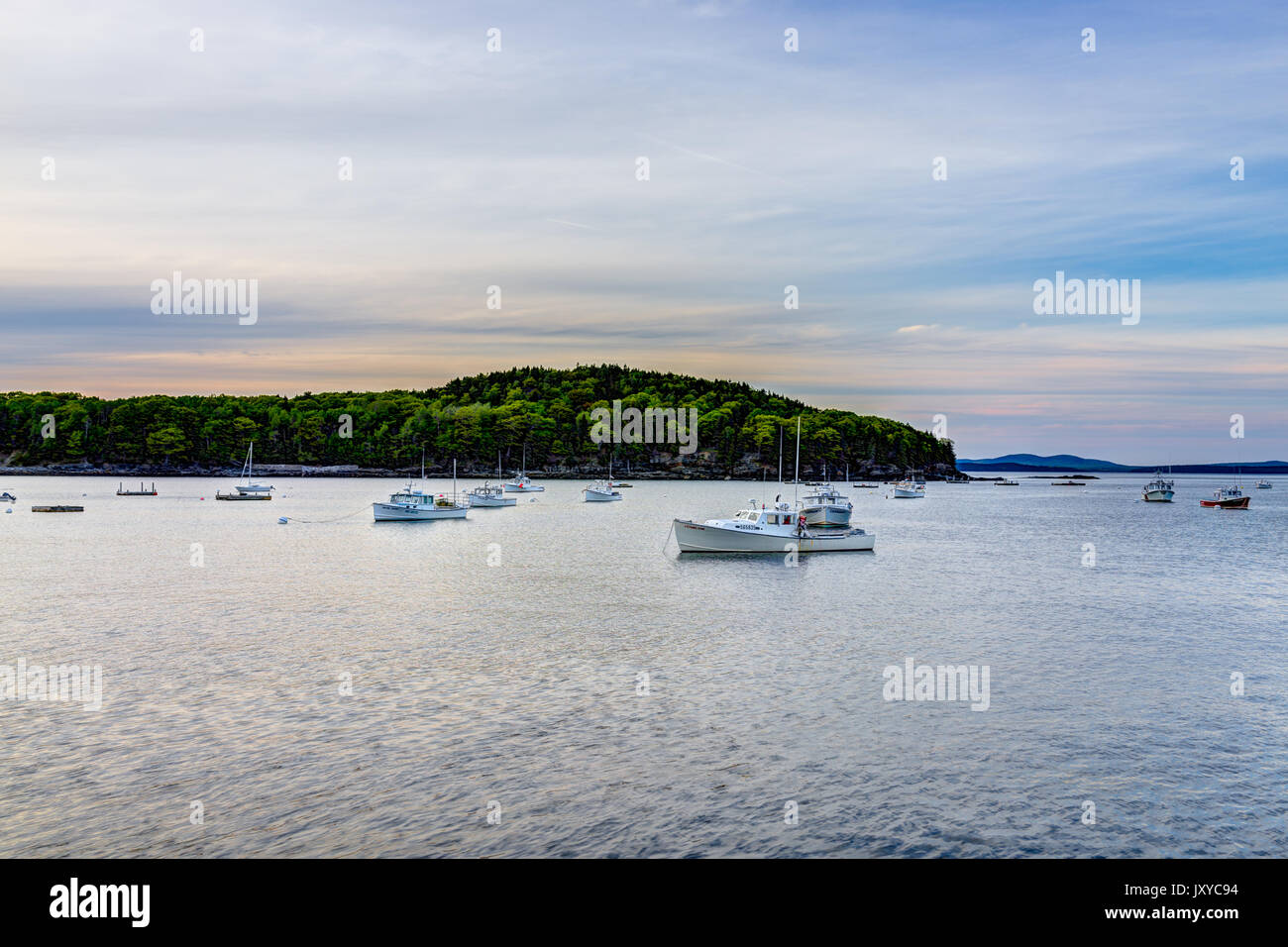 Bar Harbor, USA June 8, 2017 Sunset in Bar Harbor, Maine village with empty boats in water