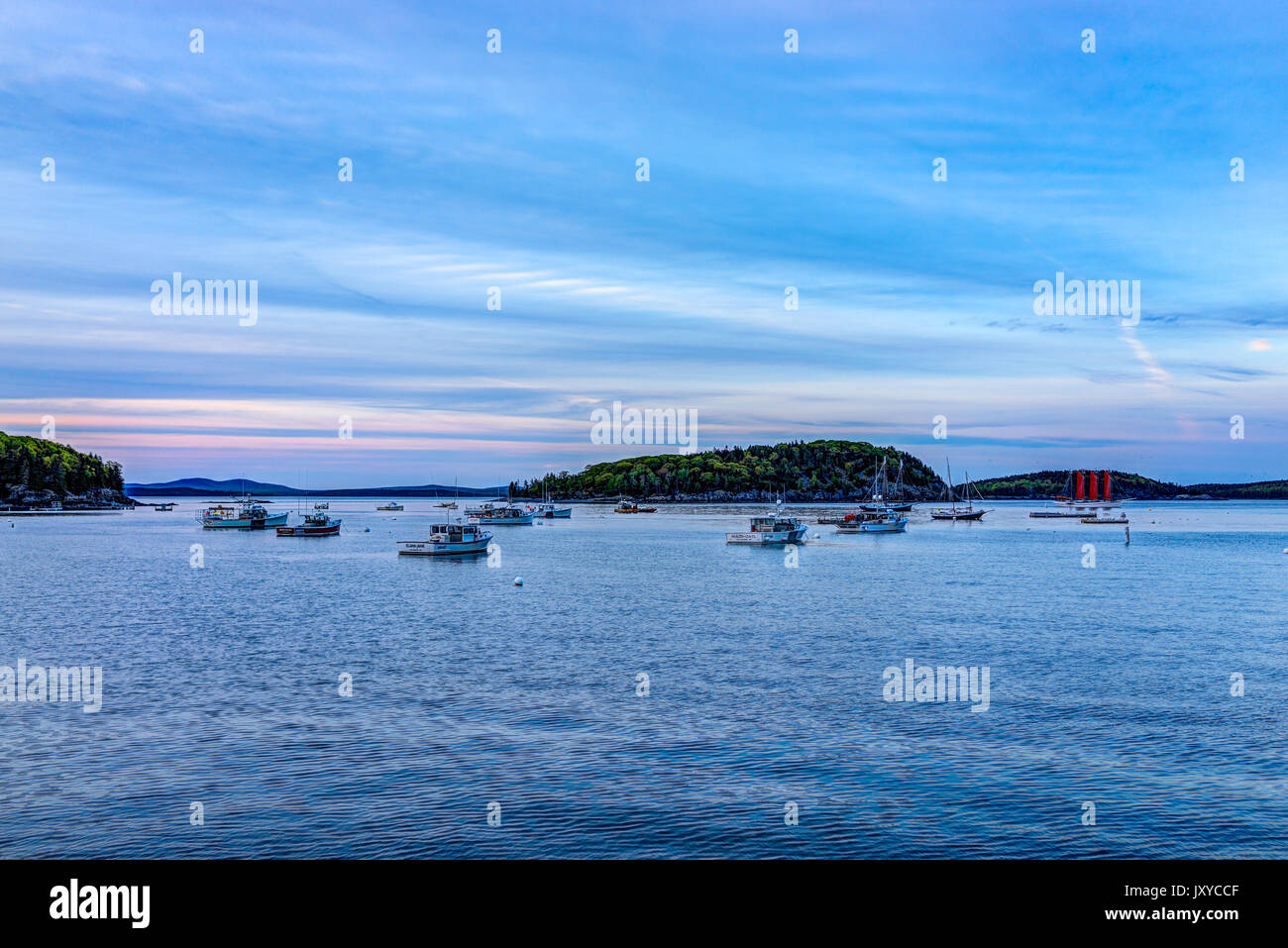 Bar Harbor, USA June 8, 2017 Sunset in Bar Harbor, Maine village with empty boats in water