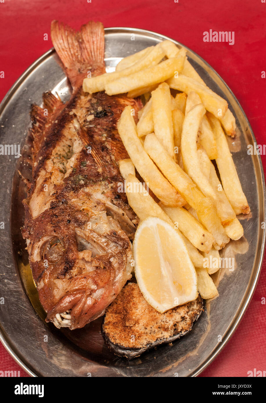 Grilled Red Roman fish as served at Kalky's restaurant in Kalk Bay, Cape Town. Stock Photo