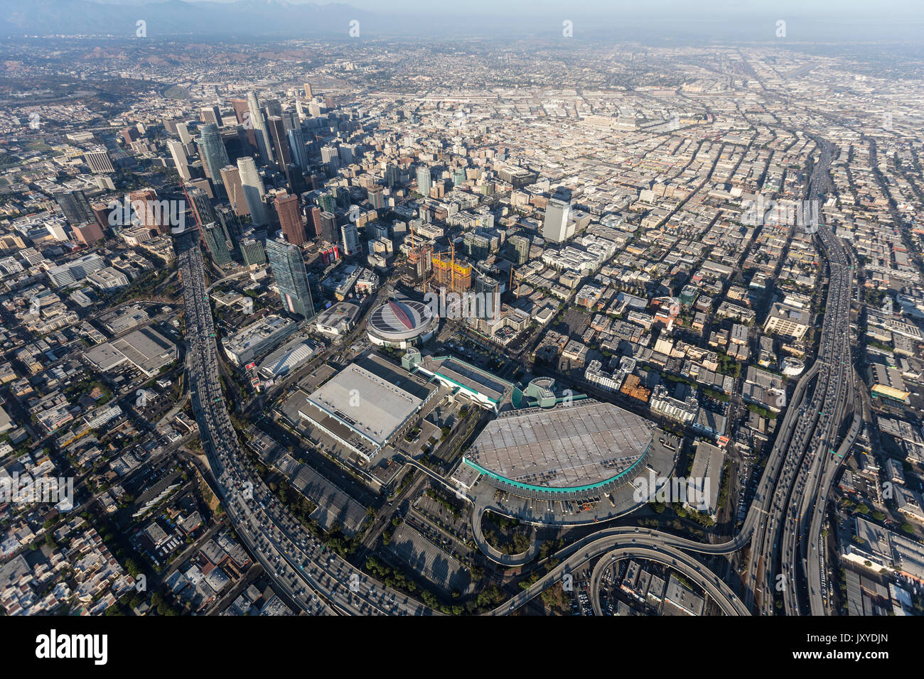 Los Angeles, California, USA - August 7, 2017:  Aerial view of Convention Center buildings, freeways and downtown towers. Stock Photo