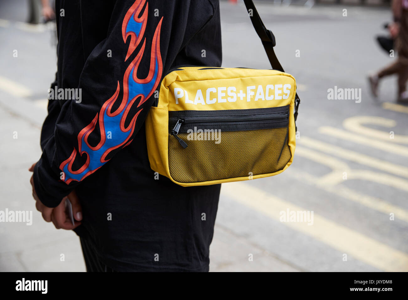 Download Mid Section Of Person In Black With Yellow Shoulder Bag Stock Photo Alamy Yellowimages Mockups