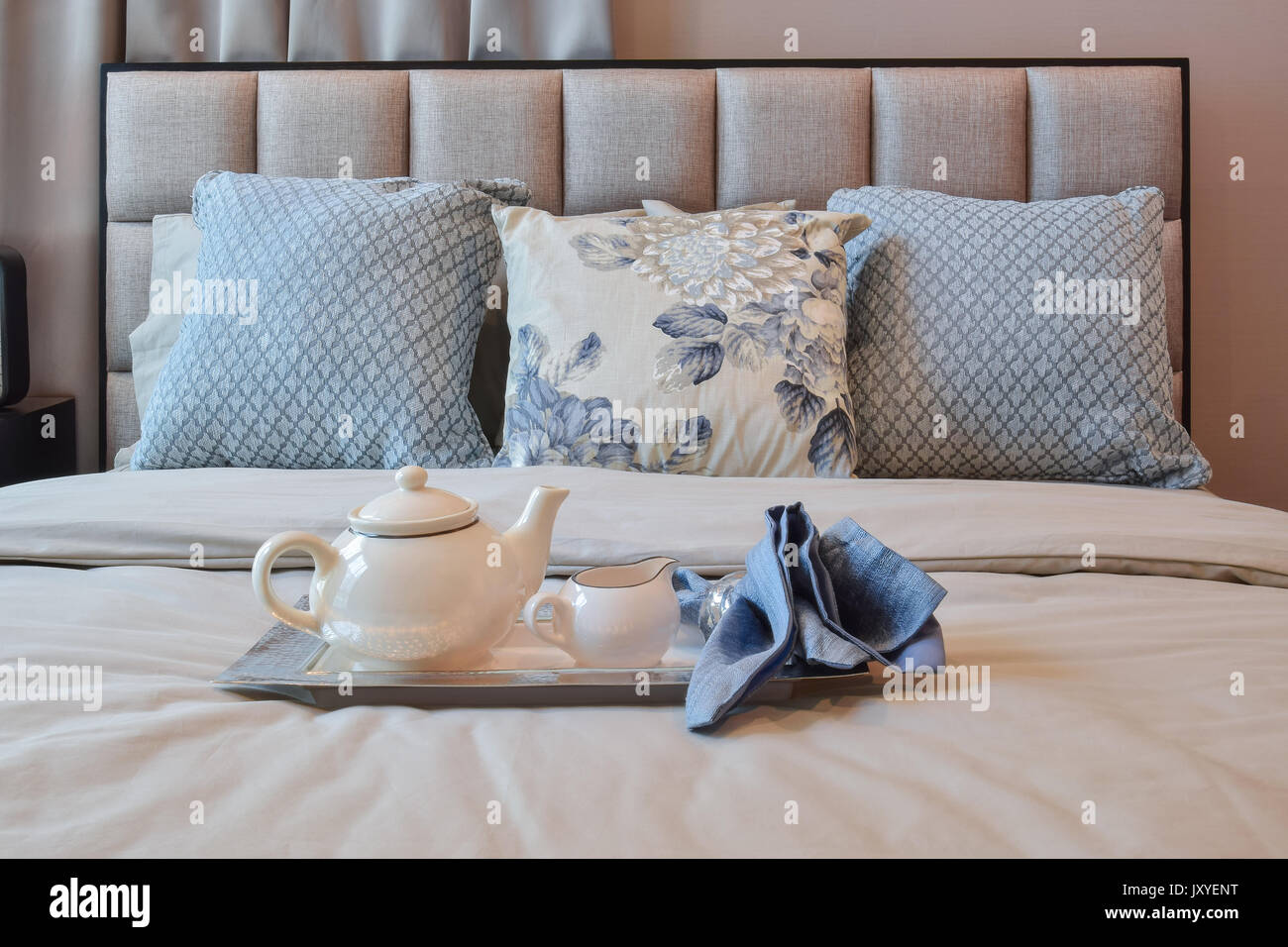 elegant bedroom interior design with floral pattern pillow and and ...