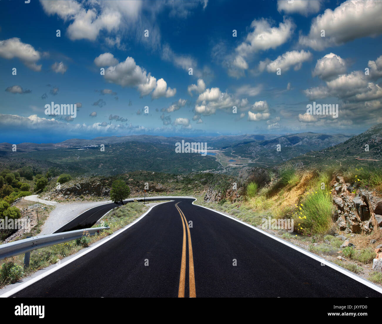 Asphalted road on a clear sunny day Stock Photo - Alamy