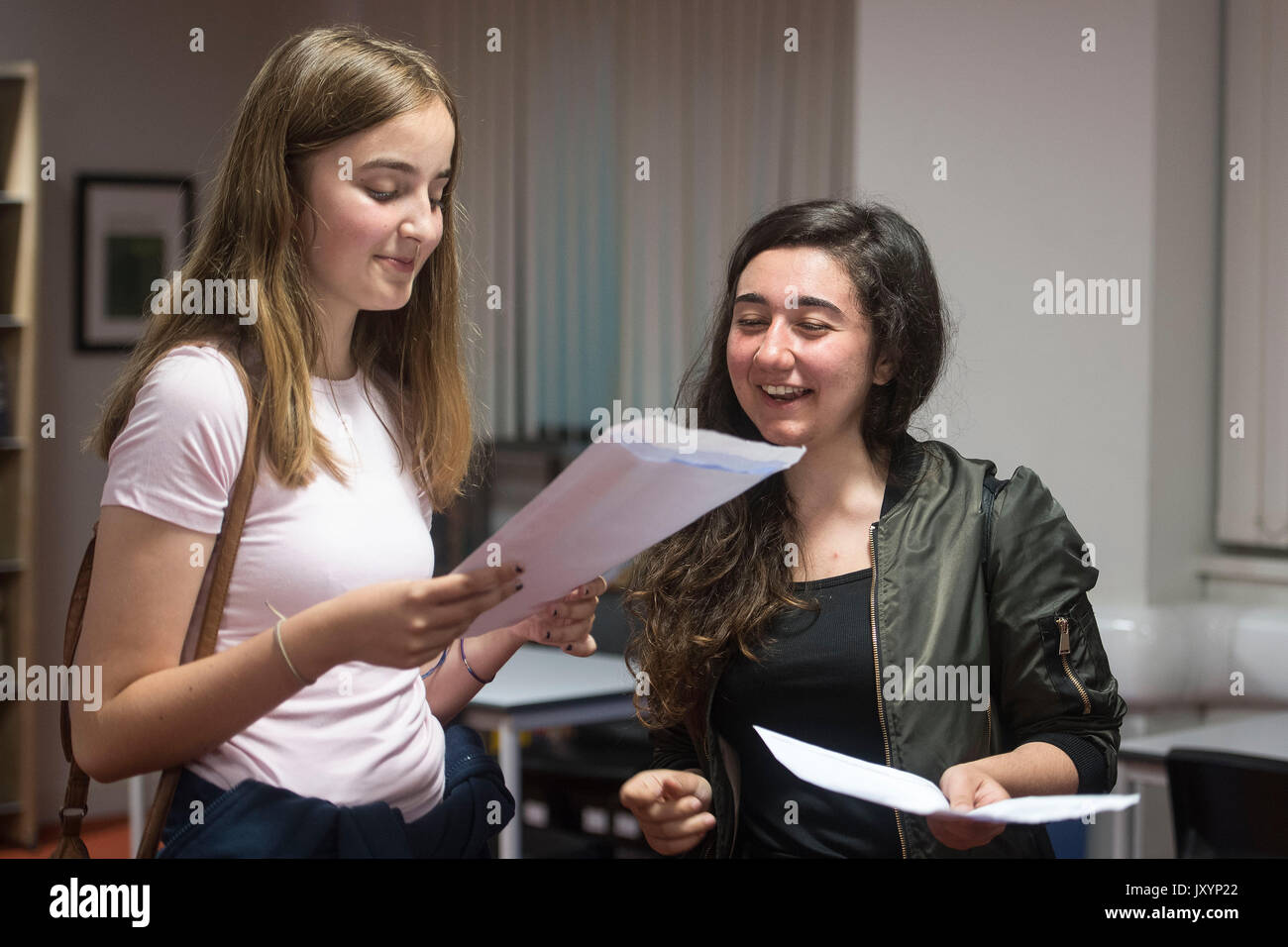 Students celebrate after collecting their Alevel results at Harris