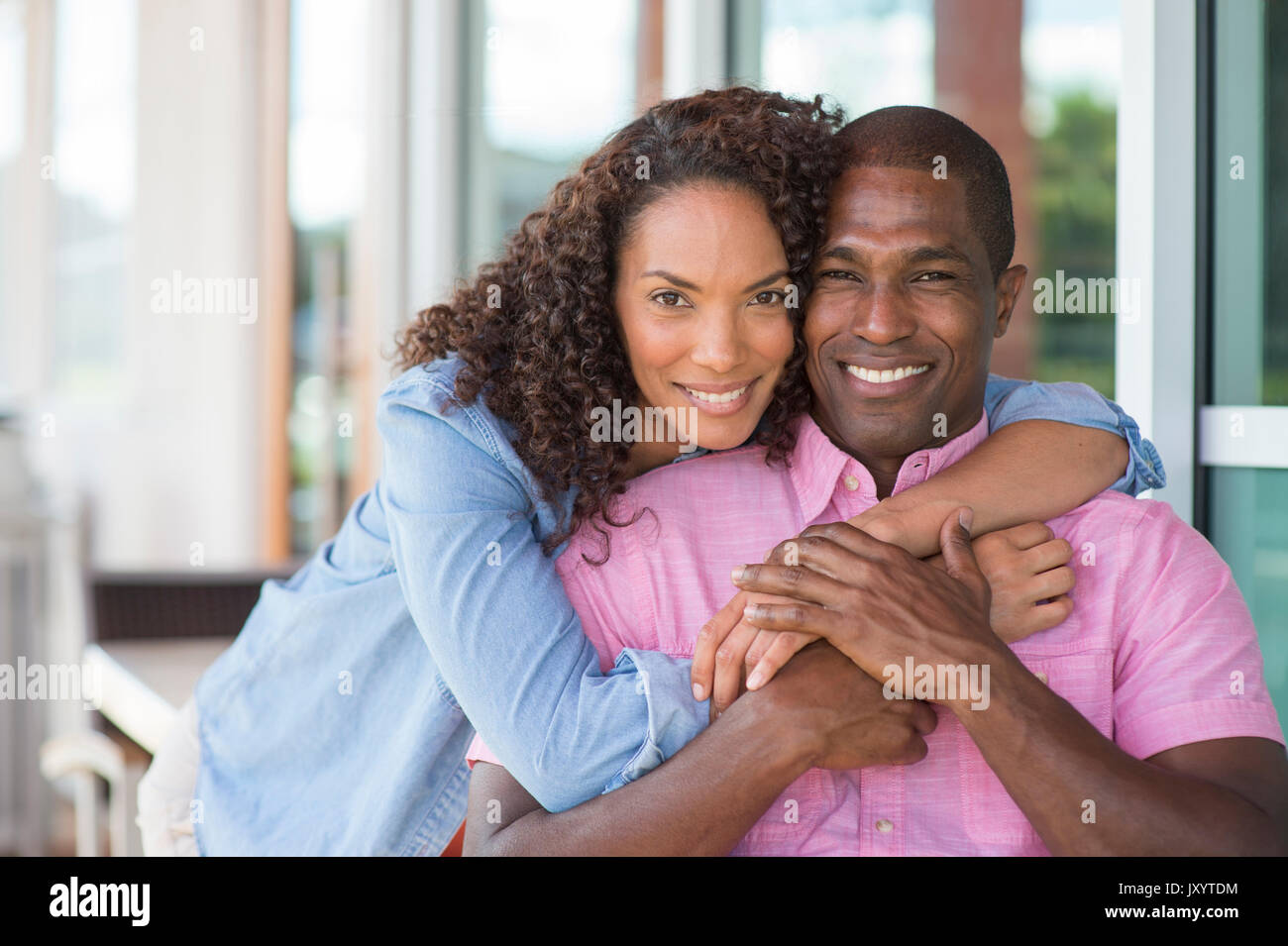 Portrait of smiling couple hugging Stock Photo