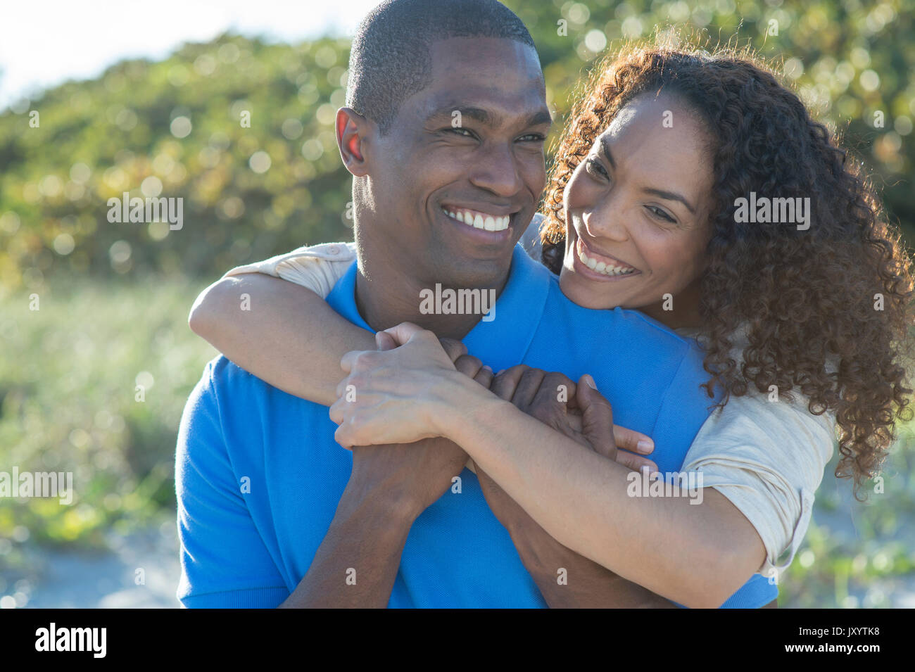 Portrait of smiling couple hugging Stock Photo