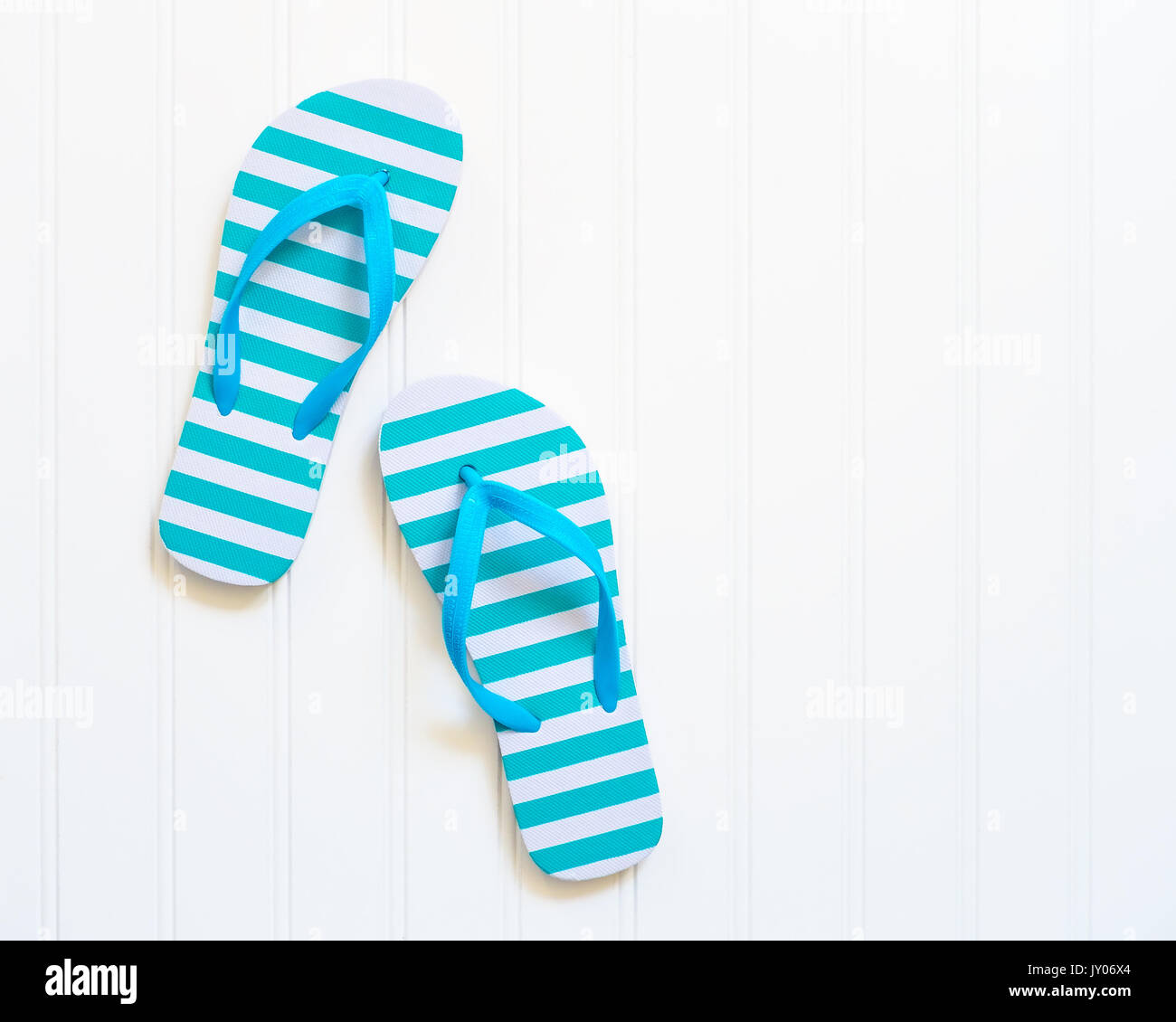 Blue and white beach sandals commonly call flip flops Stock Photo - Alamy