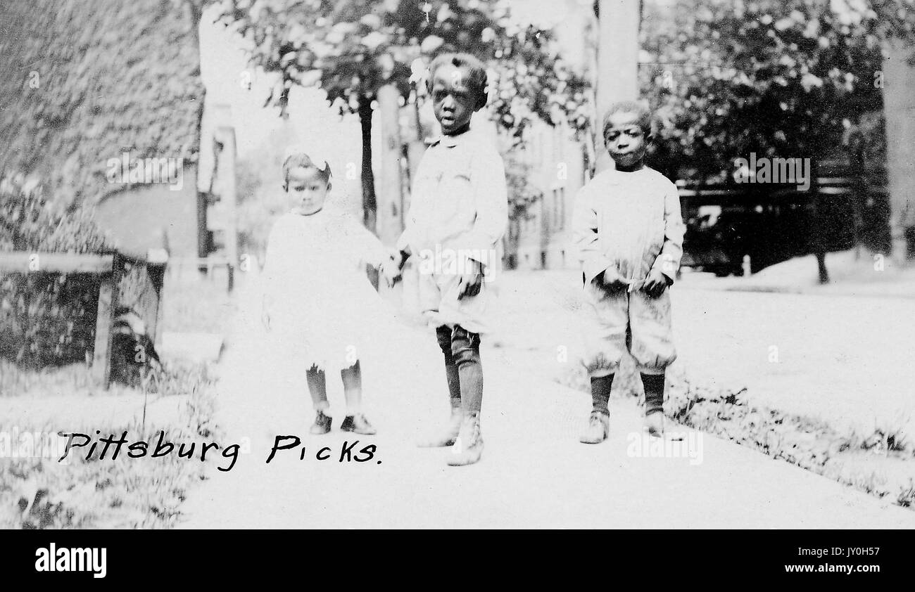 Full length standing portrait of three African American children