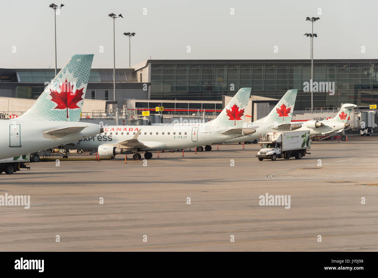 Air Canada commercial planes on the tarmac of Montreal Pierre Elliott Trudeau International Airport Stock Photo