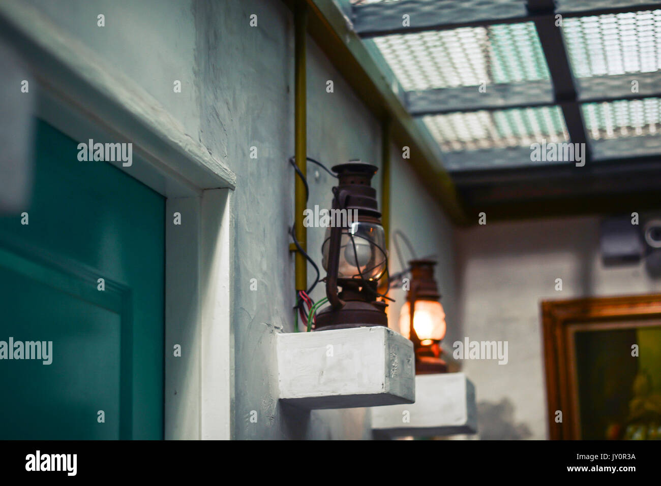 Classic vintage wall lamp in Hostel Stock Photo