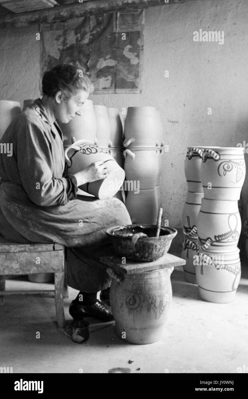 Side View Of Woman Painting Ceramic Vases Stock Photo 154298862