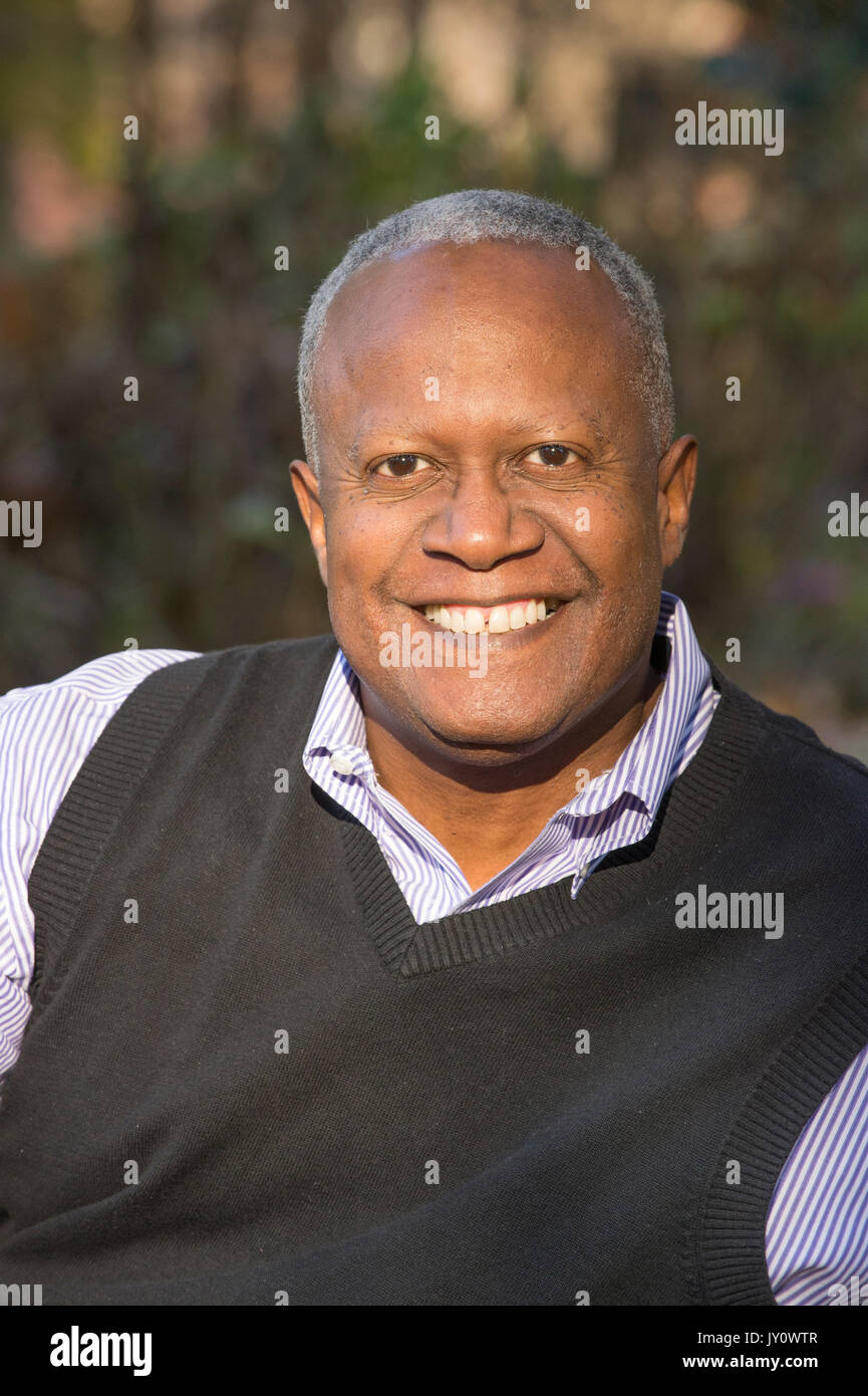 Portrait of African American man smiling outdoors Stock Photo
