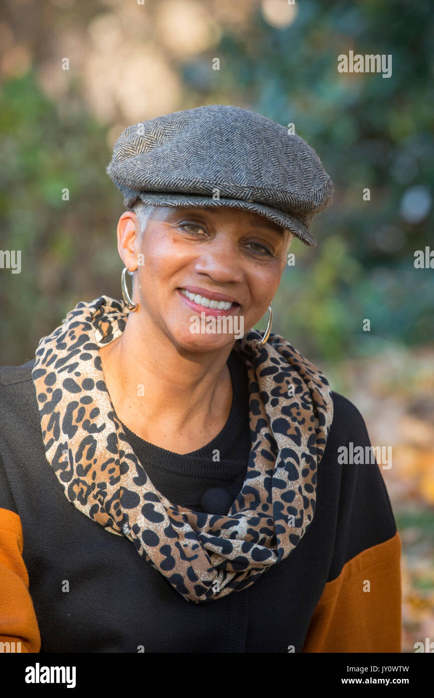 Portrait of African American woman smiling outdoors Stock Photo