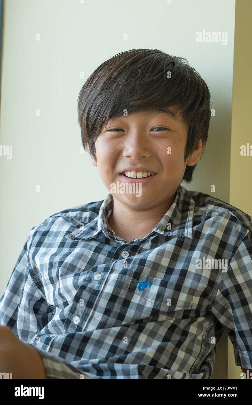 Portrait of smiling Asian boy Stock Photo