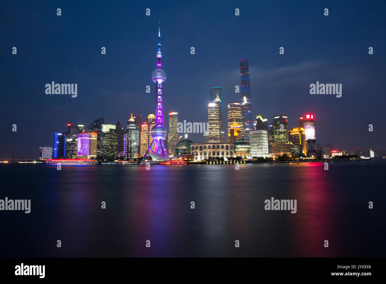 Illuminated city waterfront, Beijing, China Stock Photo