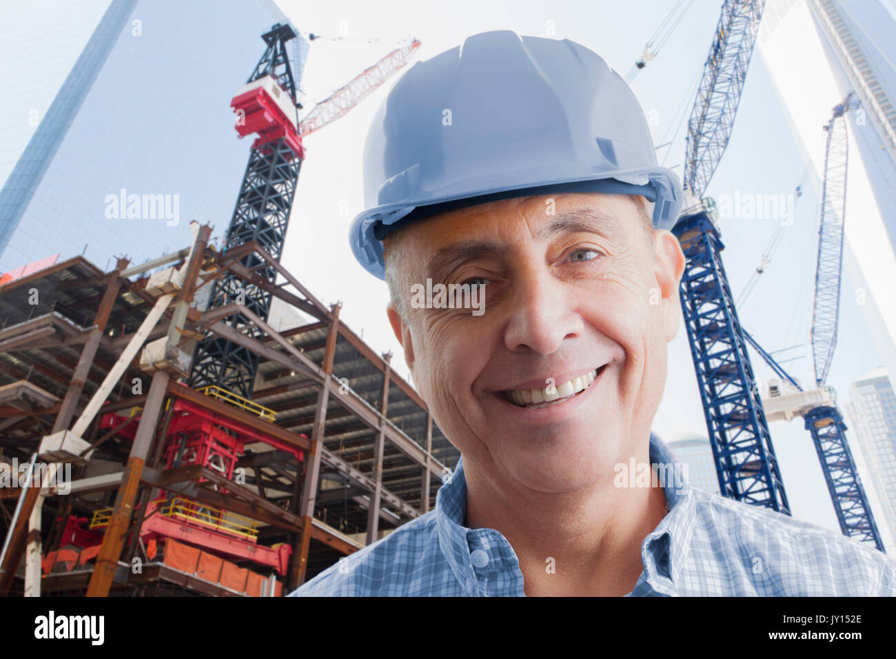 Portrait of smiling Hispanic construction worker Stock Photo