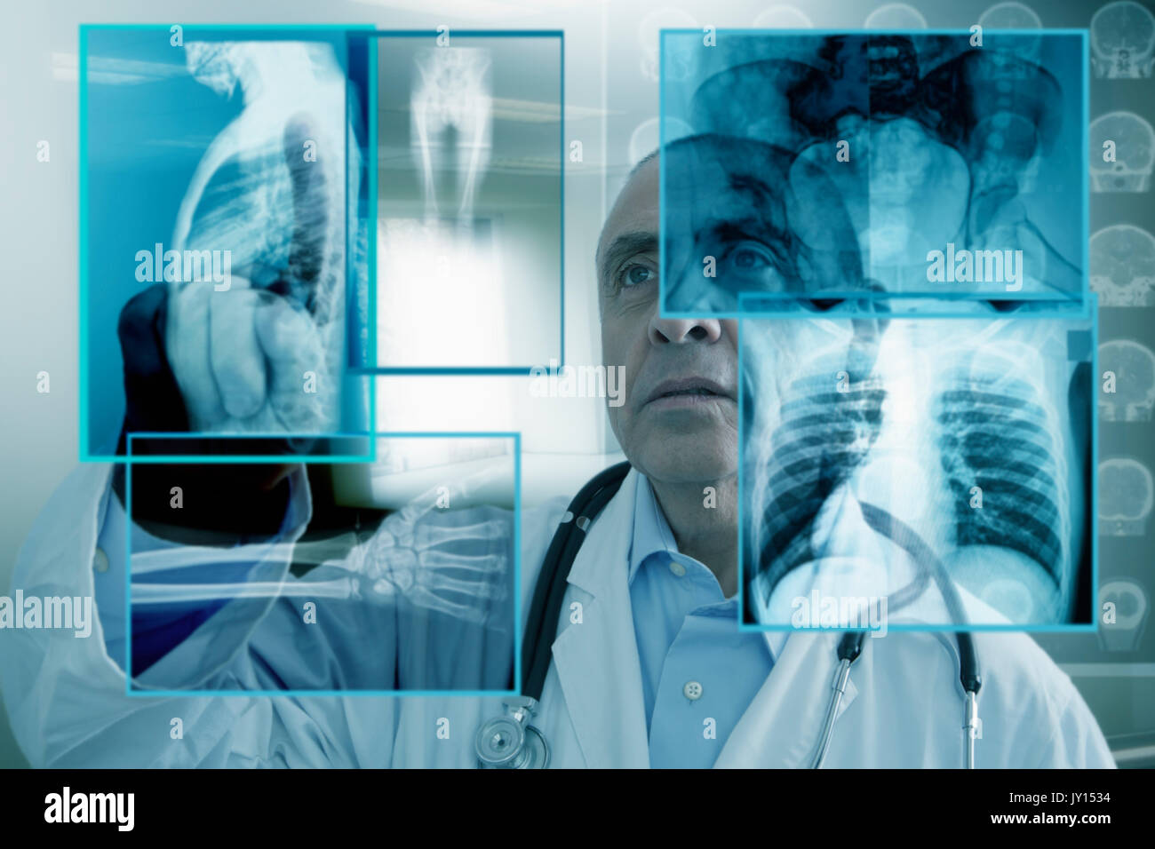 Hispanic doctor using virtual computer screen Stock Photo