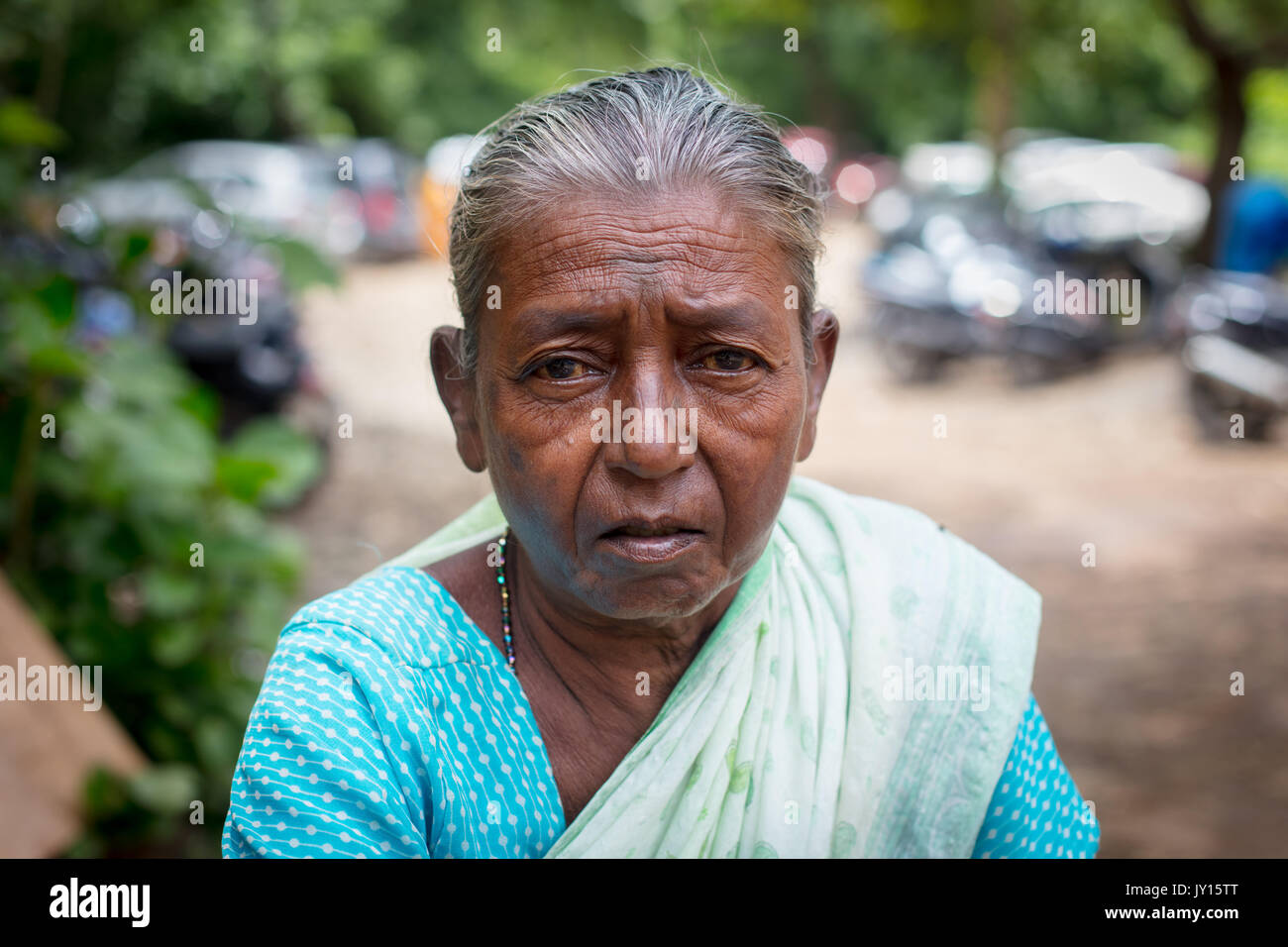 Mumbai, India - 6 August: An old woman sells food at Kanheri Caves in Mumbai, India Stock Photo