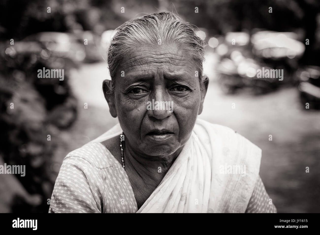 Mumbai, India - 6 August: An old woman sells food at Kanheri Caves in Mumbai, India Stock Photo