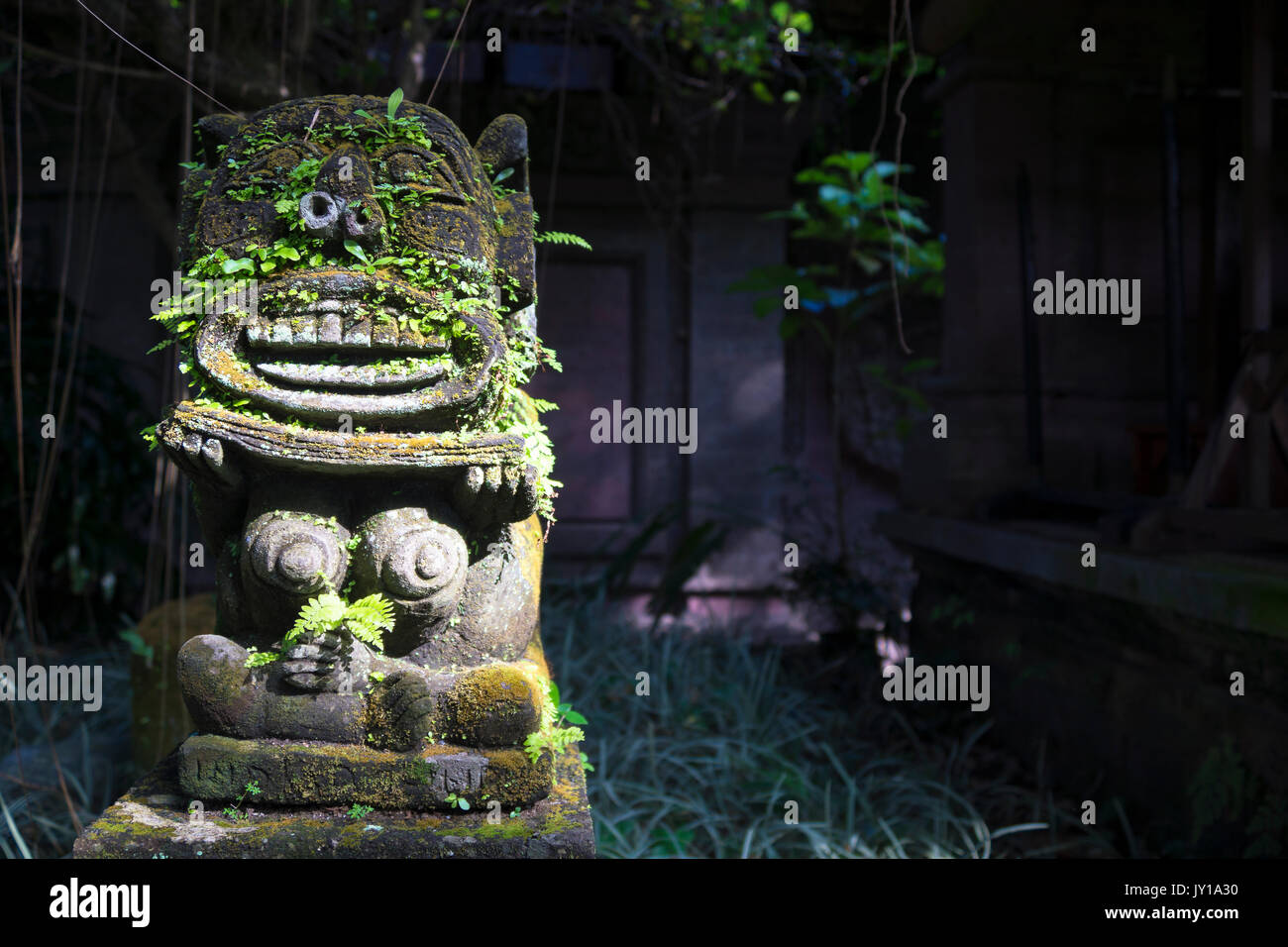 Monkey spirit sculpture in Arma Museum on the left, Ubud, Bali, Indonesia Stock Photo