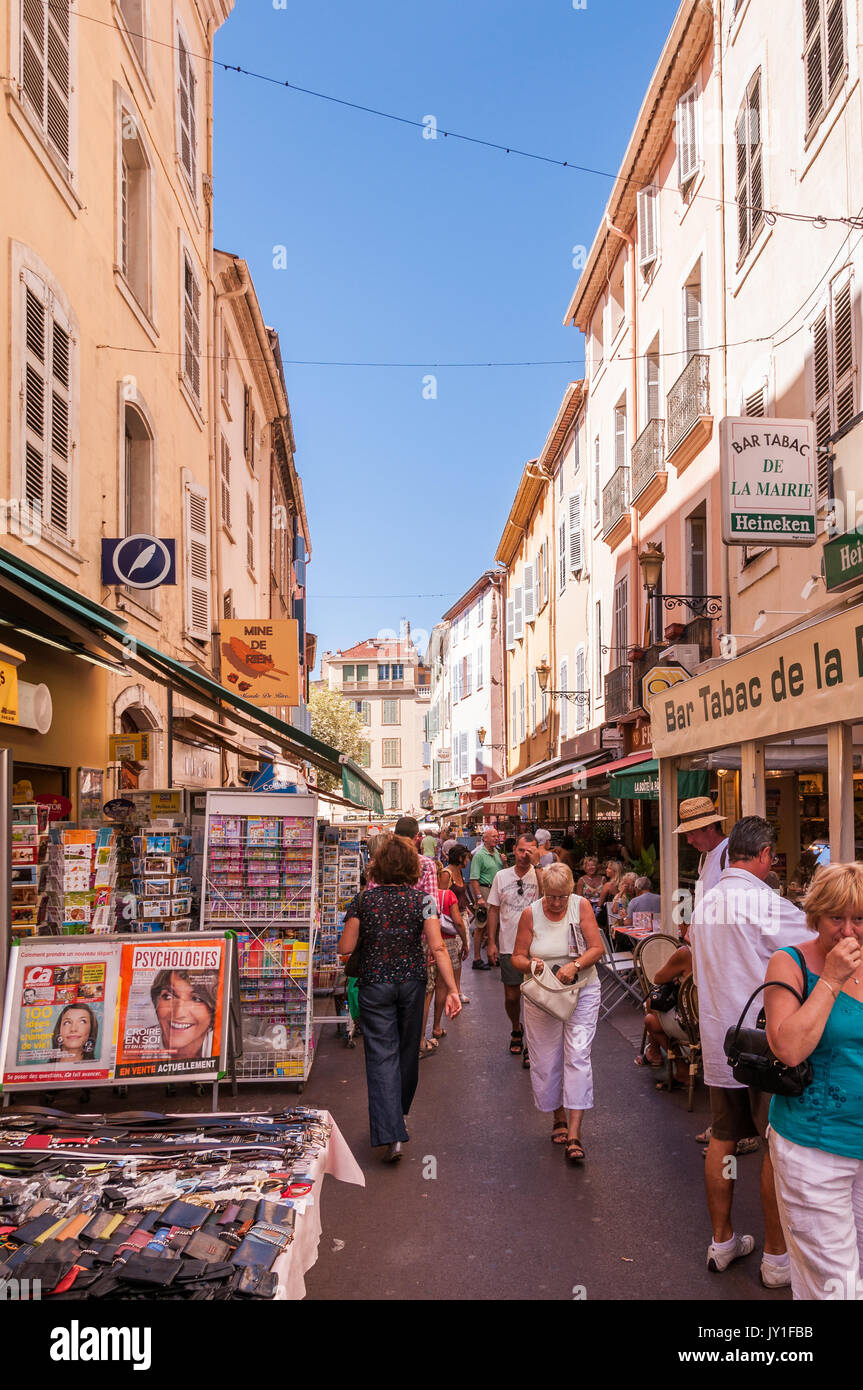 Street scene with stalls restaurants and shops in Frejus, South France ...