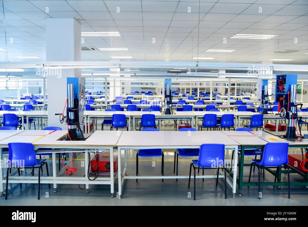 Empty clean production lines at factory's workshop Stock Photo