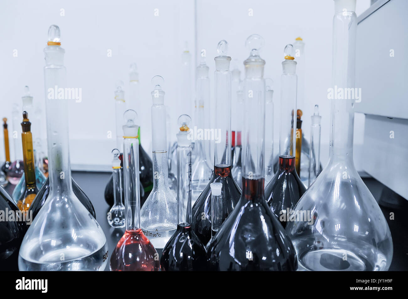 Lab beakers and flasks with different solutions Stock Photo Alamy
