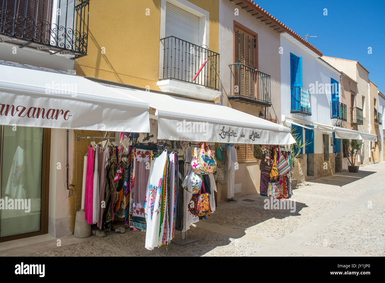 Shop front on the deserted main street of the Spanish island of Tabarca after the day trippers have departed, Alicante, Spain, Europe Stock Photo