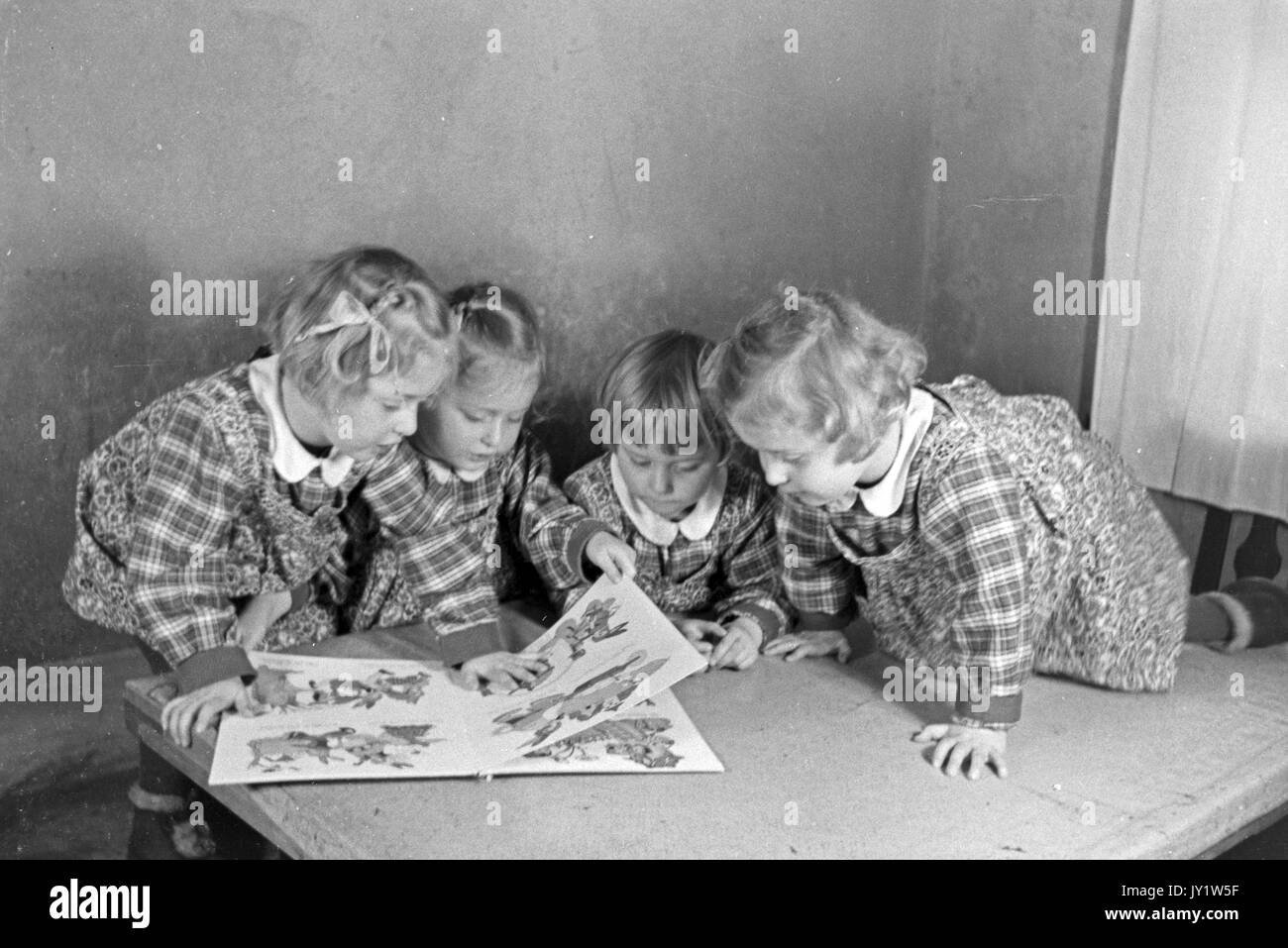 Girls Reading 1930s High Resolution Stock Photography and Images - Alamy