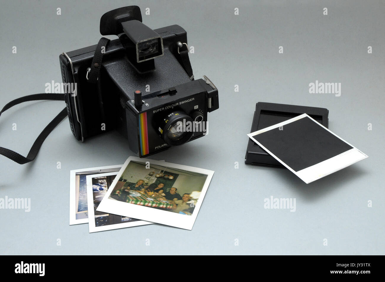 Polaroid camera, Super Color Swinger model, vintage in very good condition  and polartoid pictures Stock Photo - Alamy