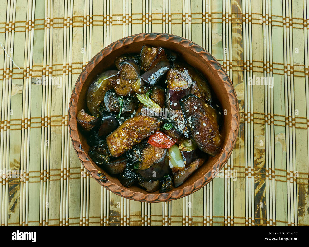 Cantonese eggplant casserol Fried vegetables in Chinese style, close