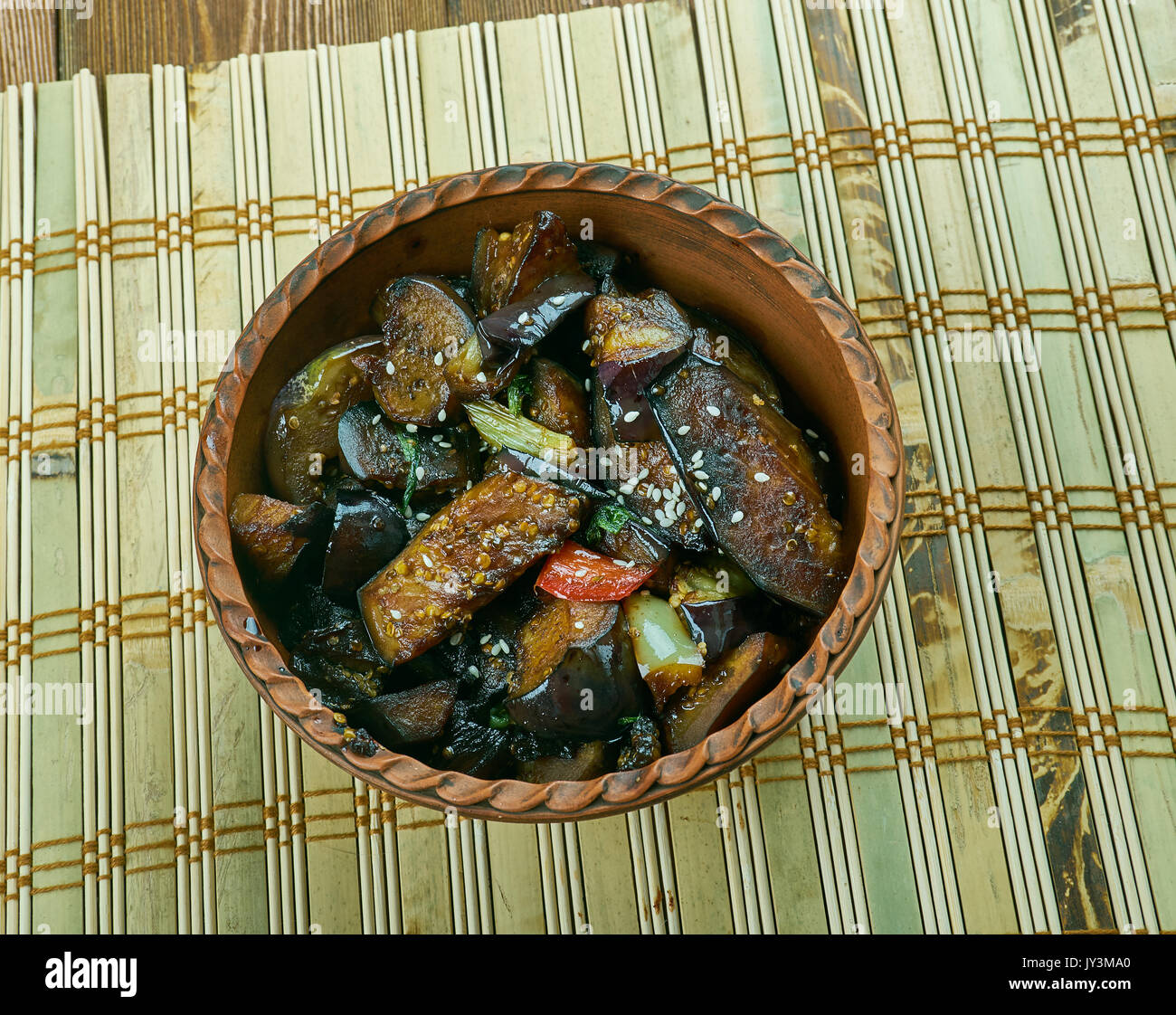 Cantonese eggplant casserol Fried vegetables in Chinese style, close