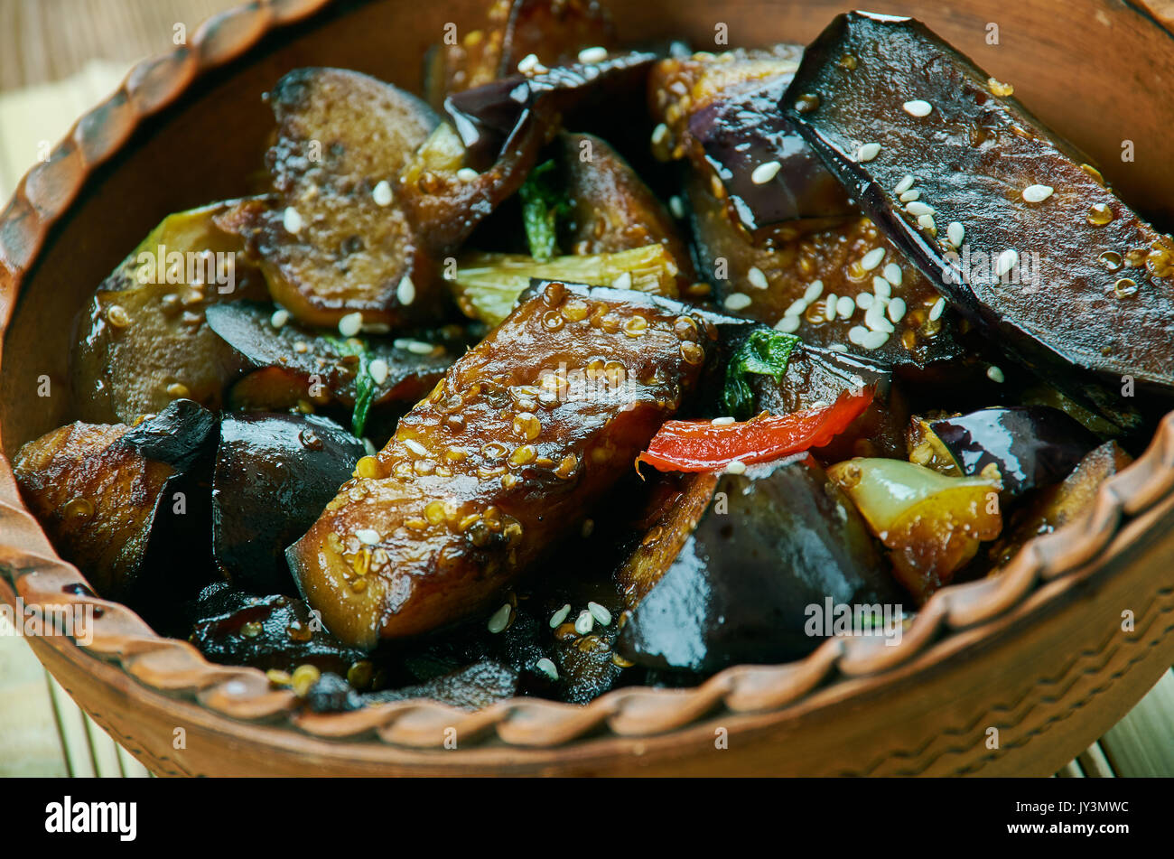 Cantonese eggplant casserol Fried vegetables in Chinese style, close