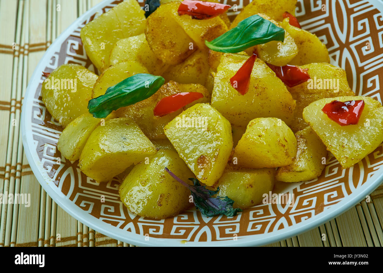 https://c8.alamy.com/comp/JY3N02/aloo-jerra-indian-dish-of-sauteed-boiled-potatoes-with-cumin-and-green-JY3N02.jpg