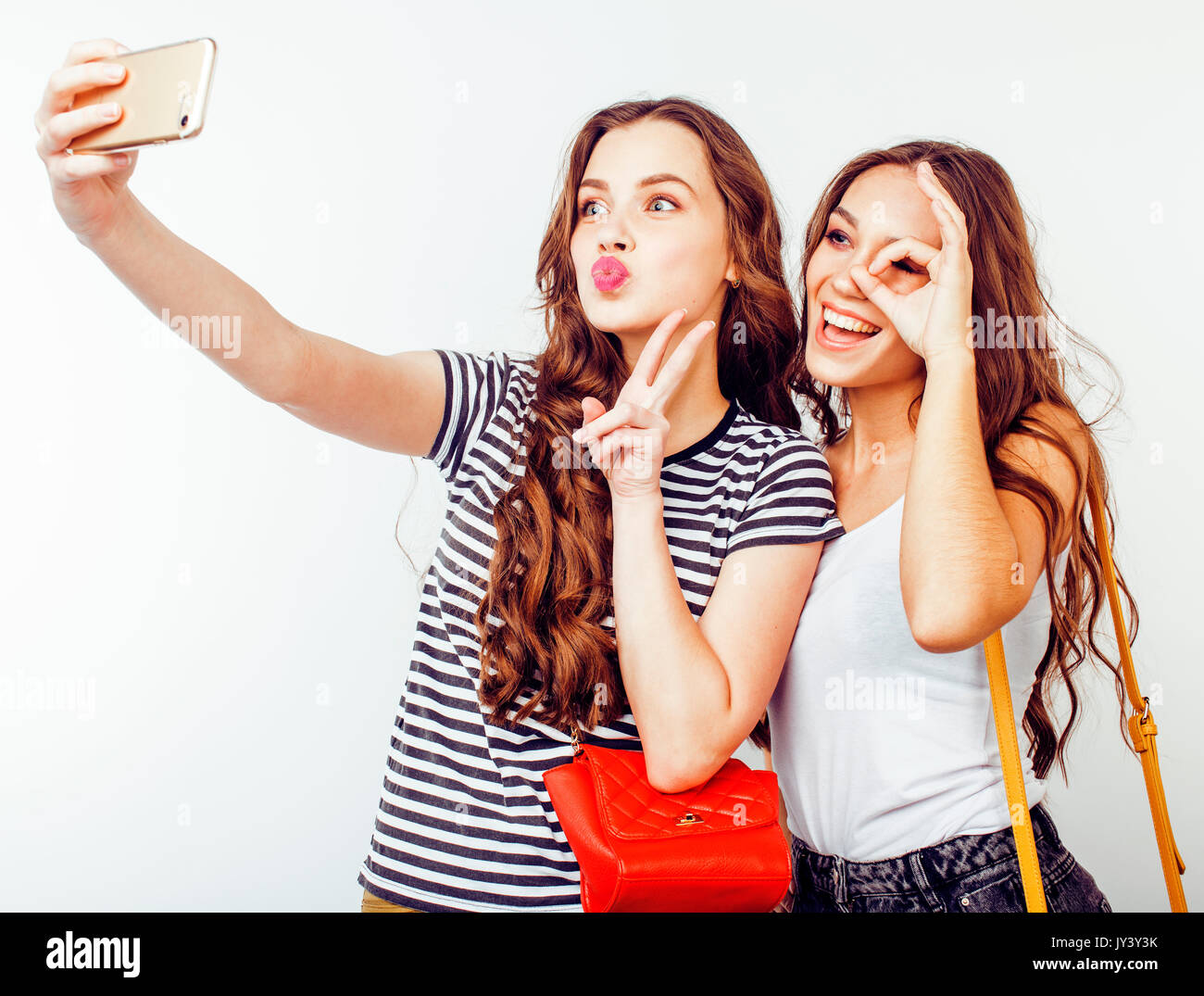 Happy Best Friends Pose for Making Selfie, Hold Smart Phone, Smile Gently,  Enjoy Recreation Time, Wears Casual T Shirt and Sunglas Stock Image - Image  of relationship, happy: 119178011