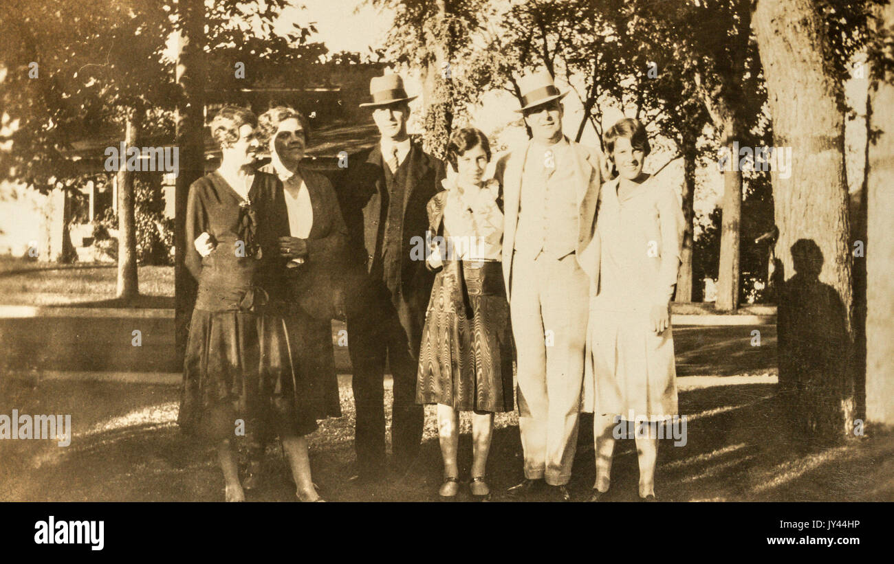 Two sets of parents pose with their teenage girls in Minnesota in 1930 Stock Photo