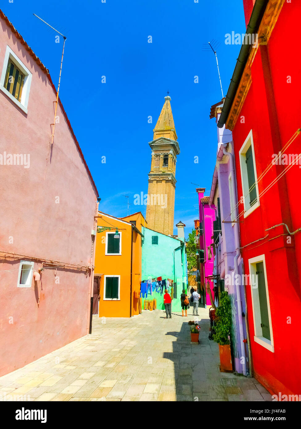 Burano, Venice, Italy - May 10, 2014: Colorful old houses on the square in the city center Stock Photo