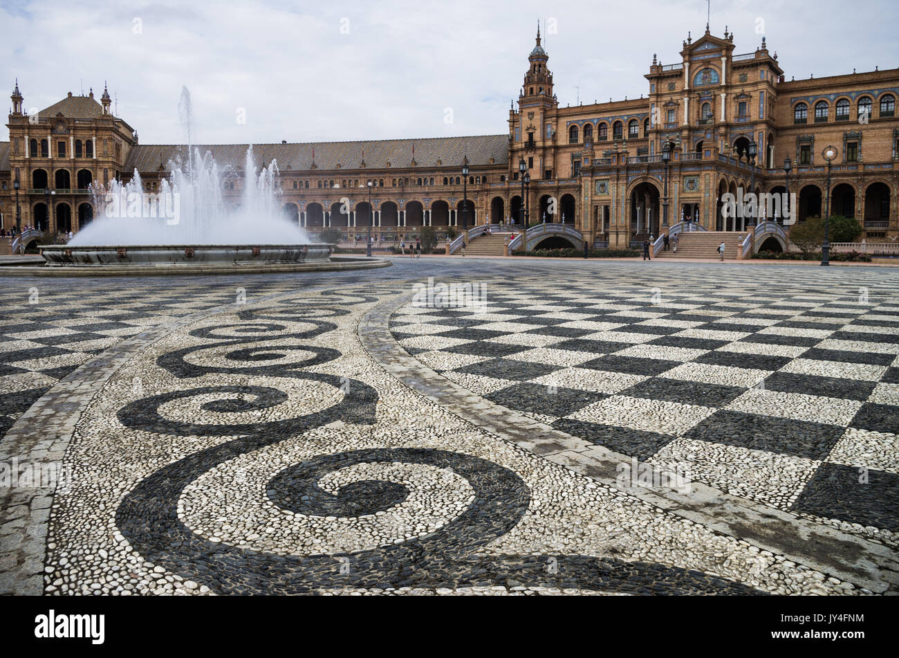 Plaza de España and Vicente Traver fountain and ornate pattern cobbles, Seville, Spain Stock Photo