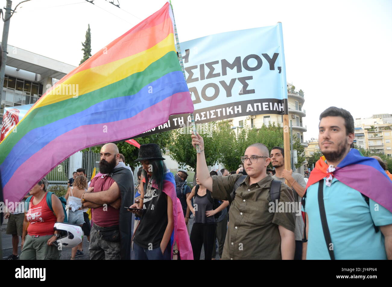 Athens, Greece. 17th Aug, 2017. KEERFA (Movement against Racism And Fascist Threat) activists demonstrate in fron of the American Embassy in Athens is support of Heather Heyer that lost her life during classes in Charlottesville Usa. Demonstrators shouted slogans against KKK, white supermascists and neonazis. Credit: George Panagakis/Pacific Press/Alamy Live News Stock Photo